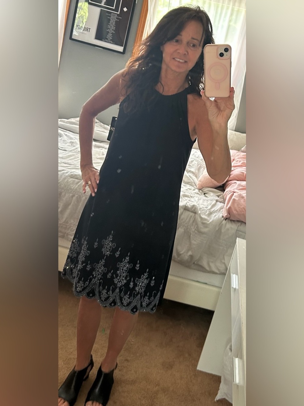 Black Sleeveless A-line Dress with Embroidered Hem